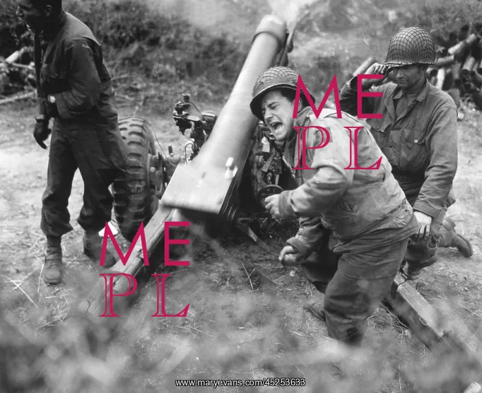 : U.S. soldiers fire a 105-mm howitzer during the : U.S. soldiers fire a 105-mm howitzer during the