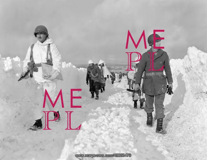 : U.S. soldiers patrol on a path plowed through : U.S. soldiers patrol on a path plowed through