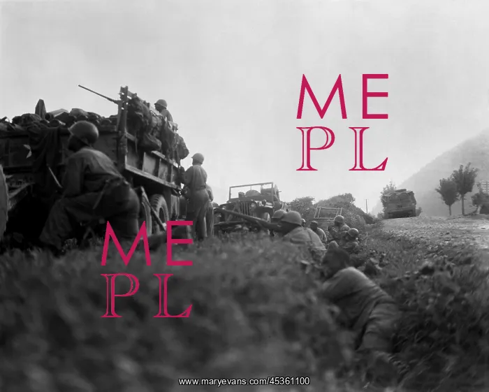 : U.S. troops shelter in a ditch while under fire : U.S. troops shelter in a ditch while under fire