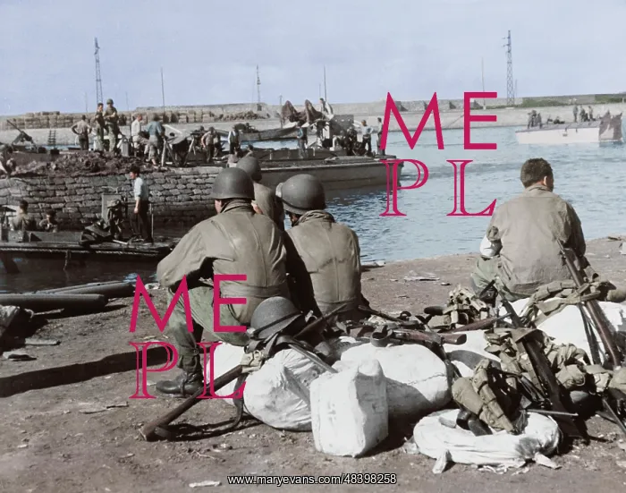 : U.S. troops taking a break at the harbor after : U.S. troops taking a break at the harbor after