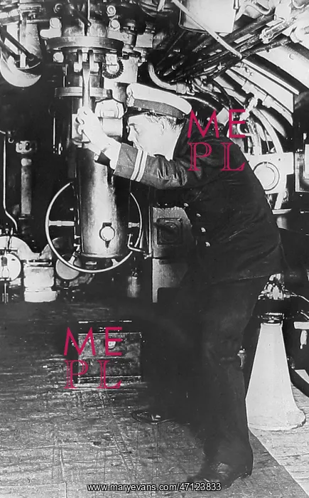  : Using the periscope in a British submarine probably 1930s