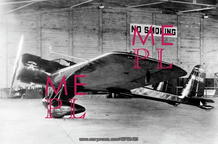 : Vance Mailplane (side view) in hangar of NR-12700 : Vance Mailplane (side view) in hangar of NR-12700