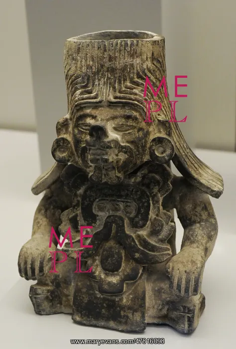 : Vase with human figure of feline traits. Ceramic : Vase with human figure of feline traits. Ceramic