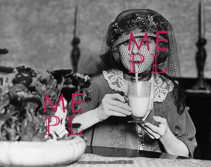 : Veiled woman drinking beverage : Veiled woman drinking beverage
