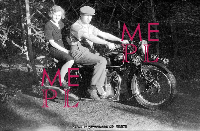 : Velocette motorcycle with couple : Velocette motorcycle with couple