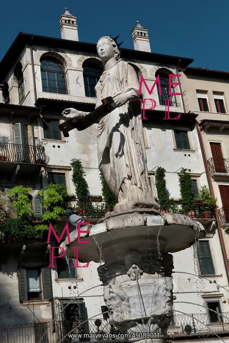 : Verona. Low angle view of the fountain of Madonna Verona : Verona. Low angle view of the fountain of Madonna Verona