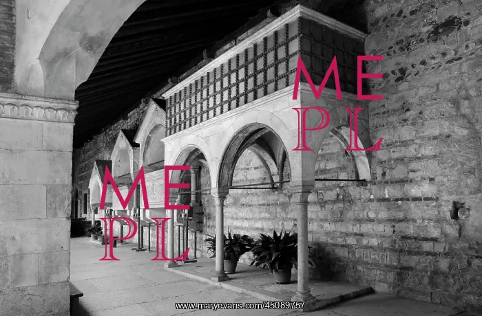 : Verona. Low angle view of tombs in the Romanesque cloister of the Basilica di San Zeno : Verona. Low angle view of tombs in the Romanesque cloister of the Basilica di San Zeno