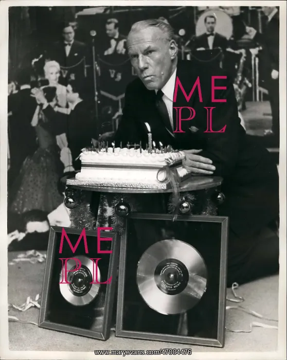 : Victor Silvester with platinum and silver discs, and cake : Victor Silvester with platinum and silver discs, and cake