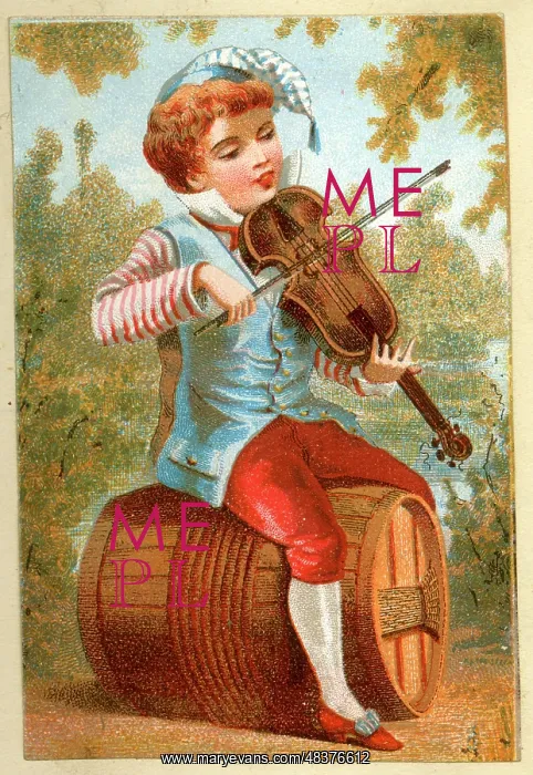  : Victorian boy violinist sitting on a barrel