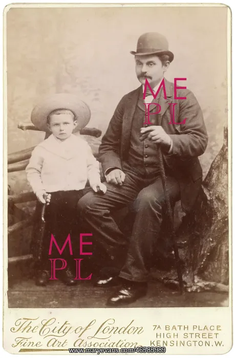 : Victorian father and son in studio setting : Victorian father and son in studio setting