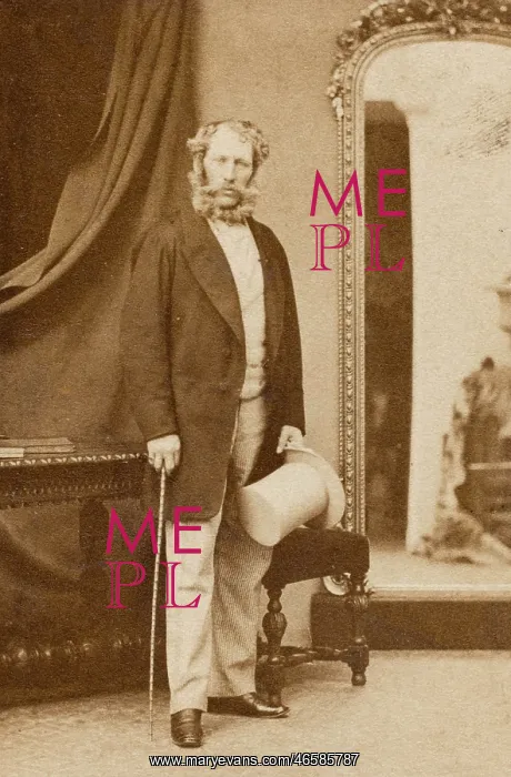 : Victorian man standing by a mirror : Victorian man standing by a mirror