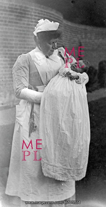 : Victorian nurse with baby : Victorian nurse with baby