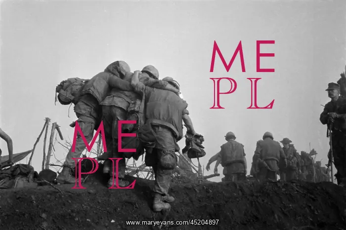 : Vietnam War. A US Marine is helped to an ? : Vietnam War. A US Marine is helped to an ?
