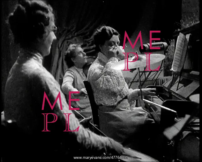 : Side View of a Female Musical Group Playing : Side View of a Female Musical Group Playing