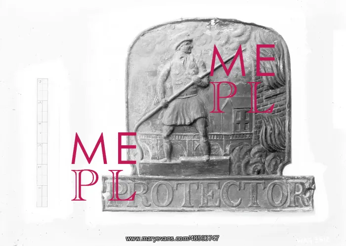 : A view of a fireman plaque entitled Protector : A view of a fireman plaque entitled Protector