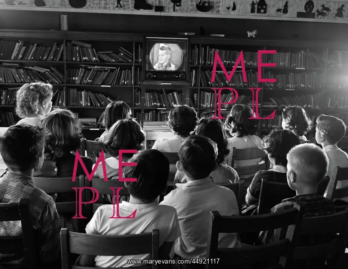 : Back view of kids in school library watching : Back view of kids in school library watching