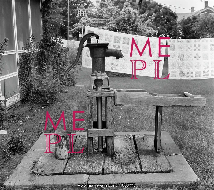 : Side View Of Old Water Pump & : Side View Of Old Water Pump &