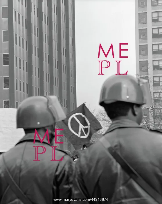: Back view of two policeman in helmets at demonstration : Back view of two policeman in helmets at demonstration