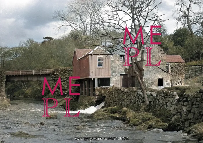  : View of a mill at the side of a river