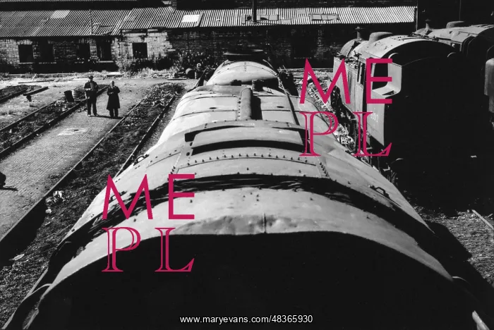 : View from top of tender along top of steam engine : View from top of tender along top of steam engine