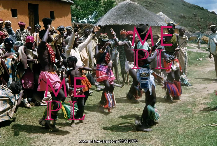 : Villagers watching youth perform Sotho dance : Villagers watching youth perform Sotho dance