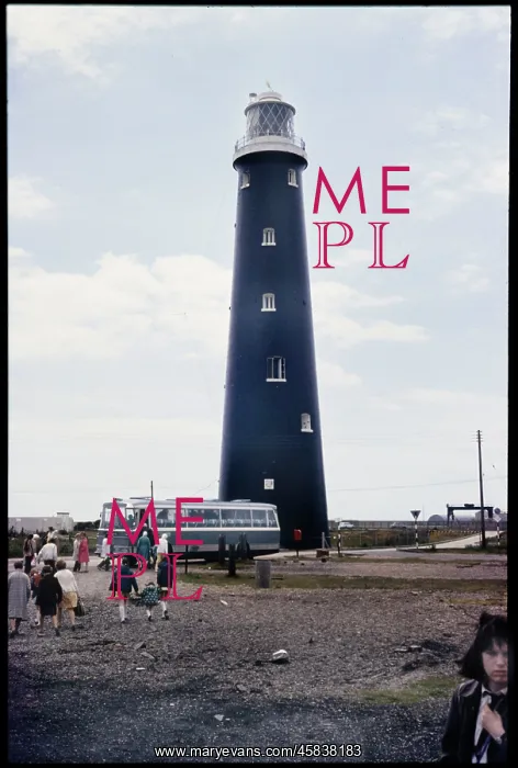 : Visitors boarding a coach - The Old Lighthouse at Dungeness : Visitors boarding a coach - The Old Lighthouse at Dungeness