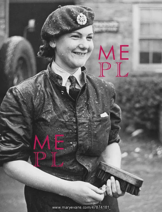  : WAAF WWII. A wet WAAF woman who was cleaning a lorry during World War II