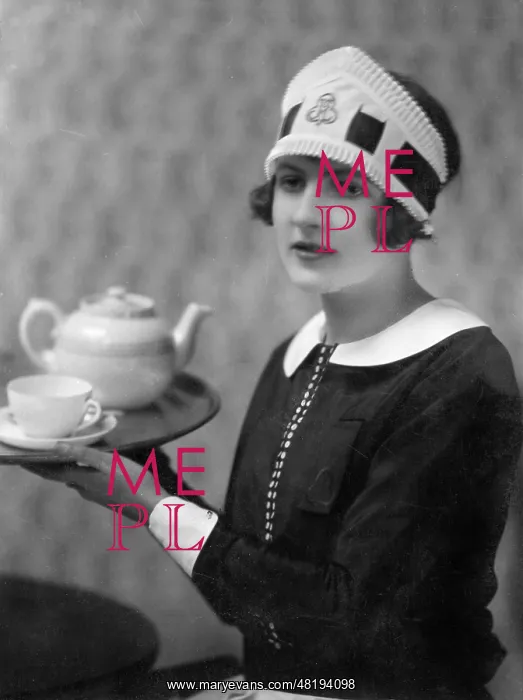 : Waitress with a tray and tea pot : Waitress with a tray and tea pot