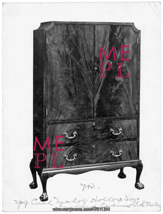 : A Walnut cabinet with drawers : A Walnut cabinet with drawers