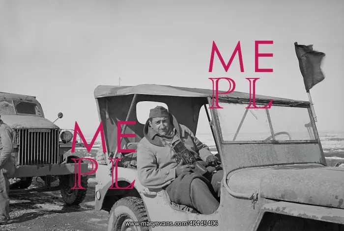 : War photographer sitting in Jeep somewhere : War photographer sitting in Jeep somewhere