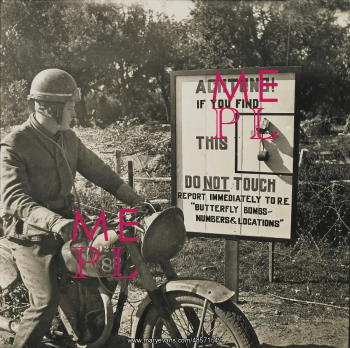 : Ware butterfly bombs - A passing despatch rider : Ware butterfly bombs - A passing despatch rider