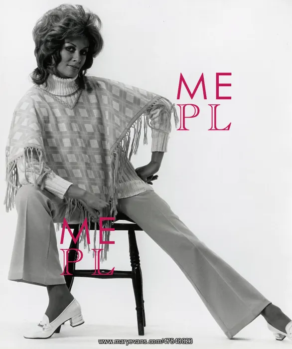 : Warly 1970s model in poncho and flares : Warly 1970s model in poncho and flares