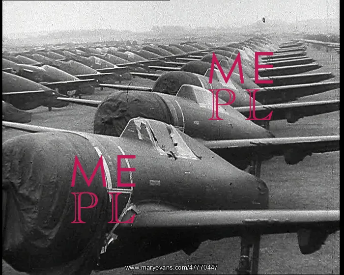 : Warplanes Sitting In An Airfield With Covers : Warplanes Sitting In An Airfield With Covers