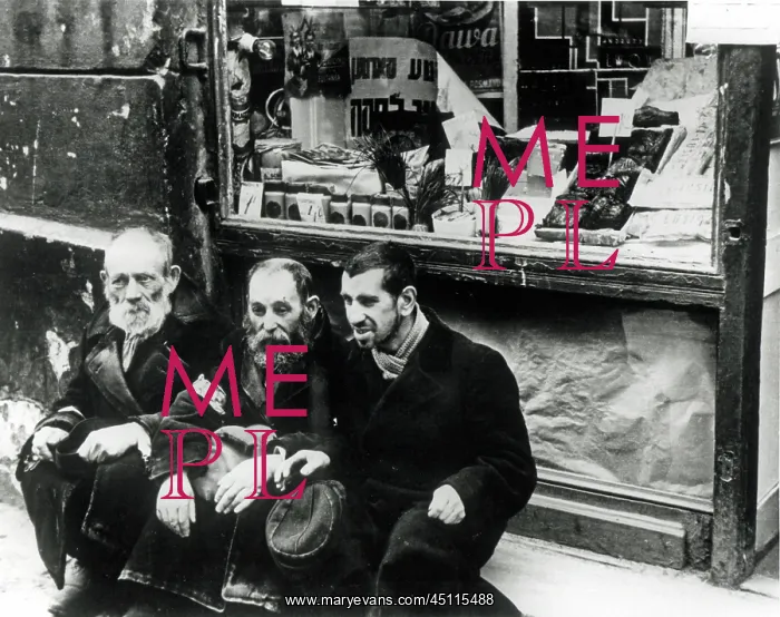 : Warsaw Ghetto - Three beggars on the sidewalk : Warsaw Ghetto - Three beggars on the sidewalk