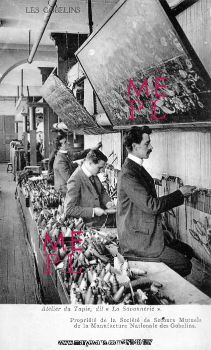  : Weavers working in a carpet factory