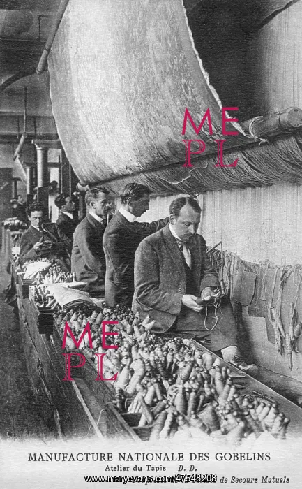  : Weavers working in a carpet factory
