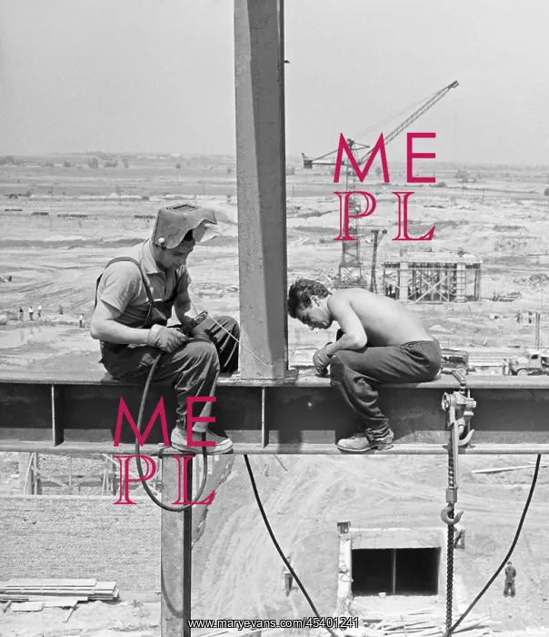 : Welder - welding - steel - column - construction : Welder - welding - steel - column - construction