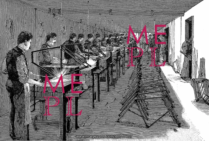 : Welding bicycle frames in an American factory : Welding bicycle frames in an American factory