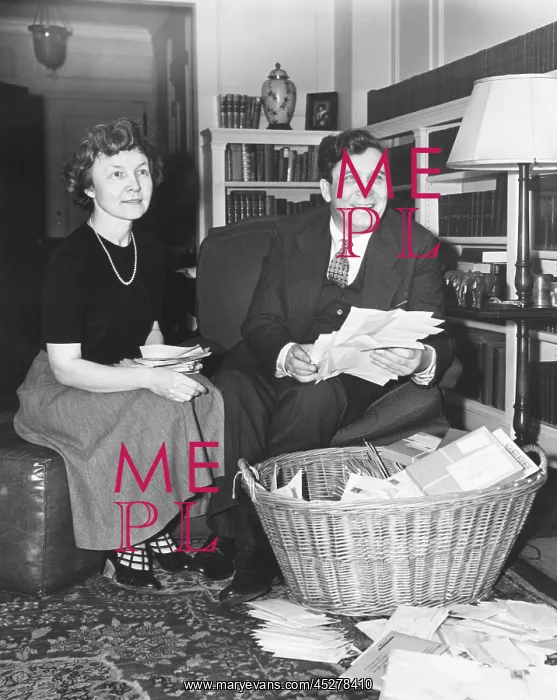: Wendell and Edith with a basket of mail after his : Wendell and Edith with a basket of mail after his