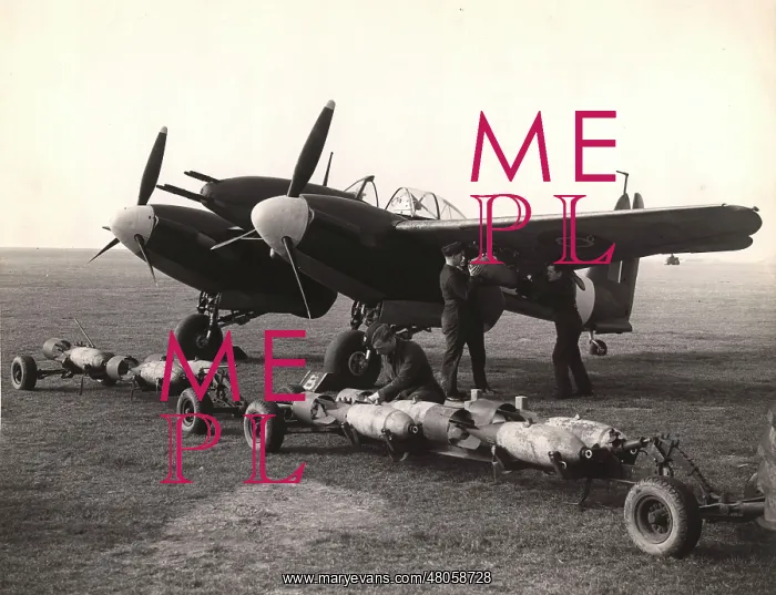 : Westland Whirlwind is bombed up during a practice session : Westland Whirlwind is bombed up during a practice session