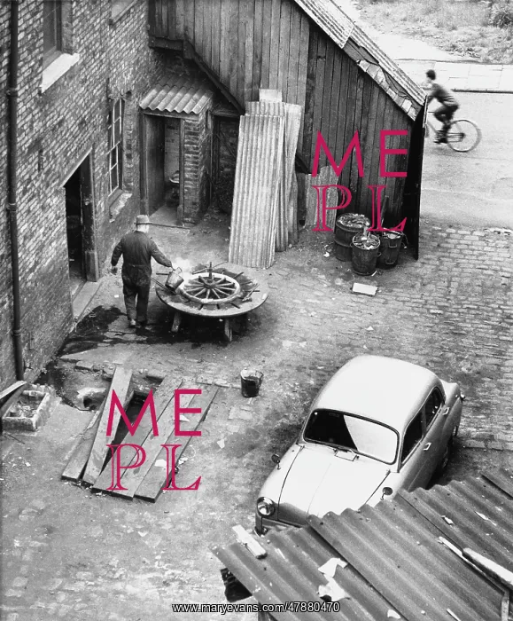 : Wheelwright in garage yard - Manchester : Wheelwright in garage yard - Manchester