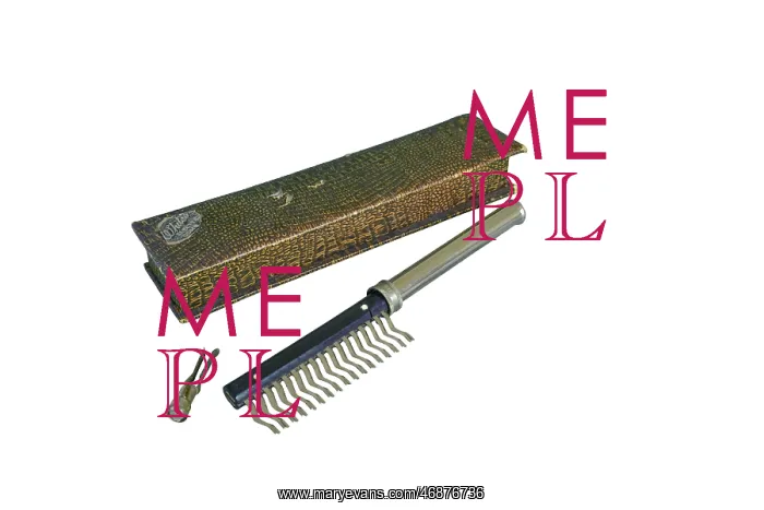  : White's Electric Comb with box