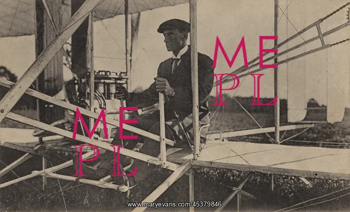 : Wilbur Wright sits at the controls of his : Wilbur Wright sits at the controls of his