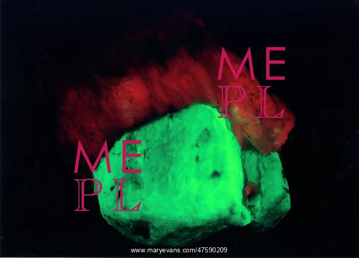 : Willemite. A specimen of willemite (zinc silicate) photographed under UV light : Willemite. A specimen of willemite (zinc silicate) photographed under UV light