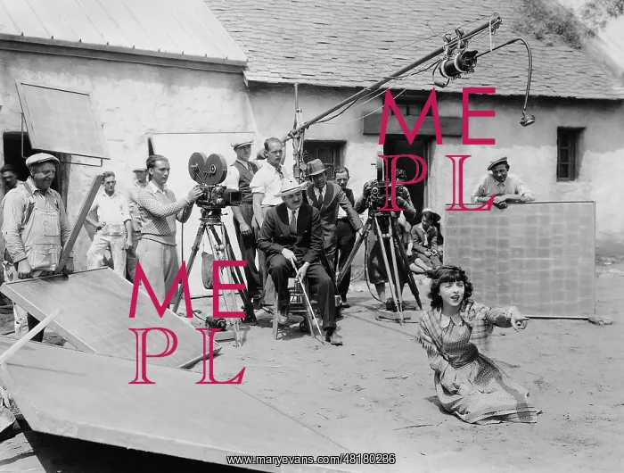 : William Seiter and Colleen Moore during filming of Smiling : William Seiter and Colleen Moore during filming of Smiling