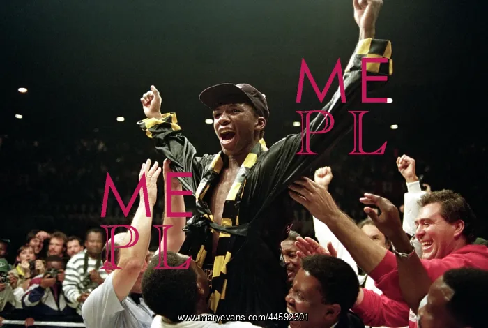 : The winning boxer is hoisted shoulder-high by : The winning boxer is hoisted shoulder-high by