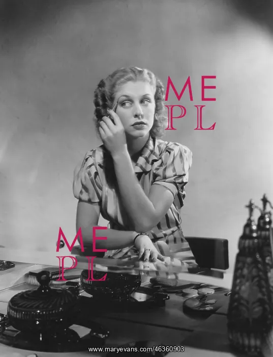: Woman applies makeup at her dressing table : Woman applies makeup at her dressing table
