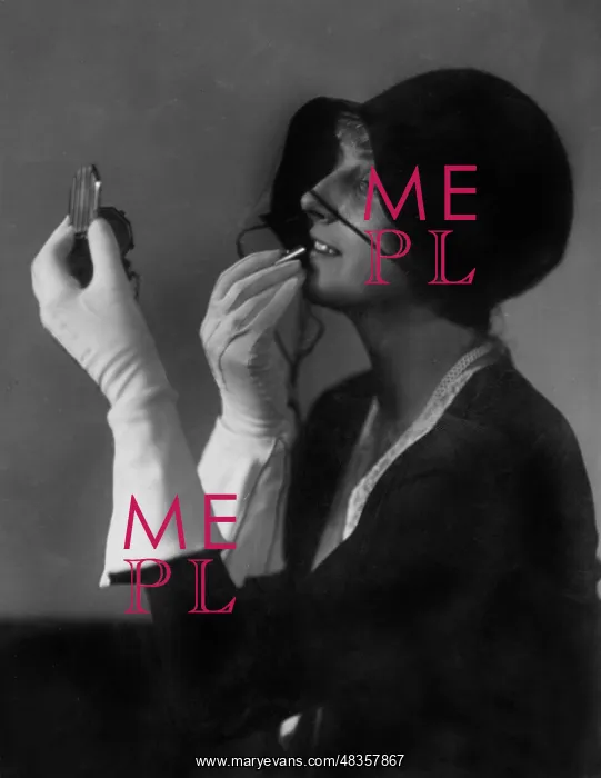 : A woman applying makeup, 1935 : A woman applying makeup, 1935