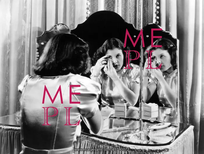 : Woman applying makeup : Woman applying makeup