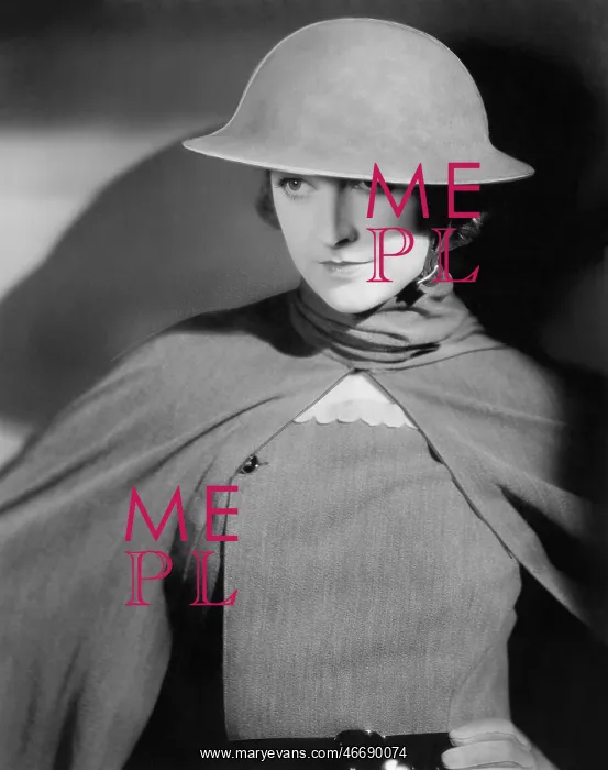 : Woman in an army helmet and uniform : Woman in an army helmet and uniform